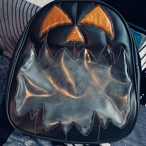 love pain and stitches pin backpack